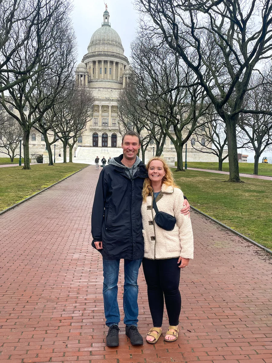 Couple standing in front of the Rhode Island Statehouse