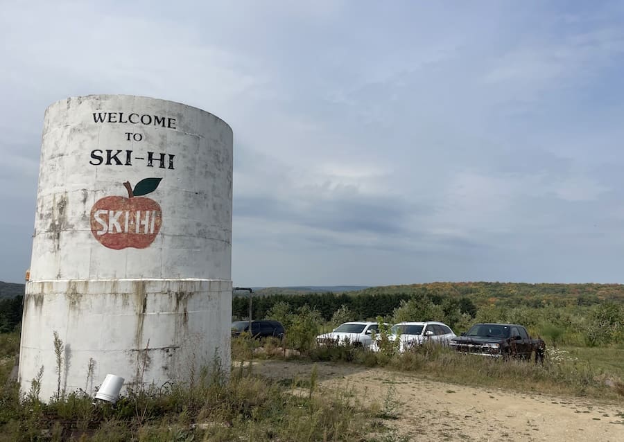 Image of Ski-Hi Fruit Farm tower overlooking the apple trees. 