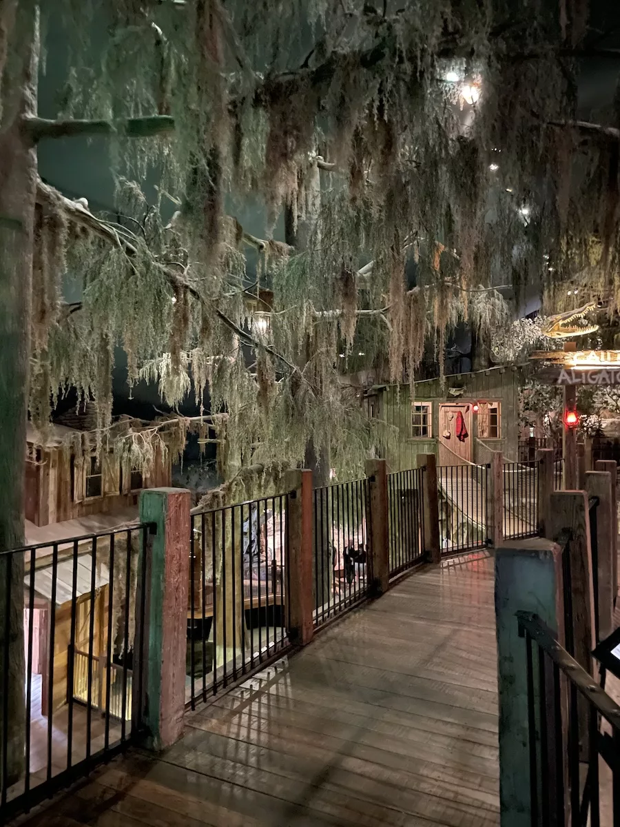 Indoor boardwalk surrounded by plants at Wonders of Wildlife National Museum and Aquarium 