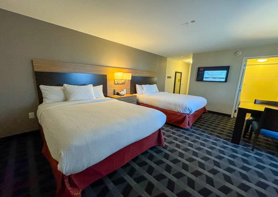 Bedroom view featuring two queen beds at TownePlace Suites Jeffersonville, IN