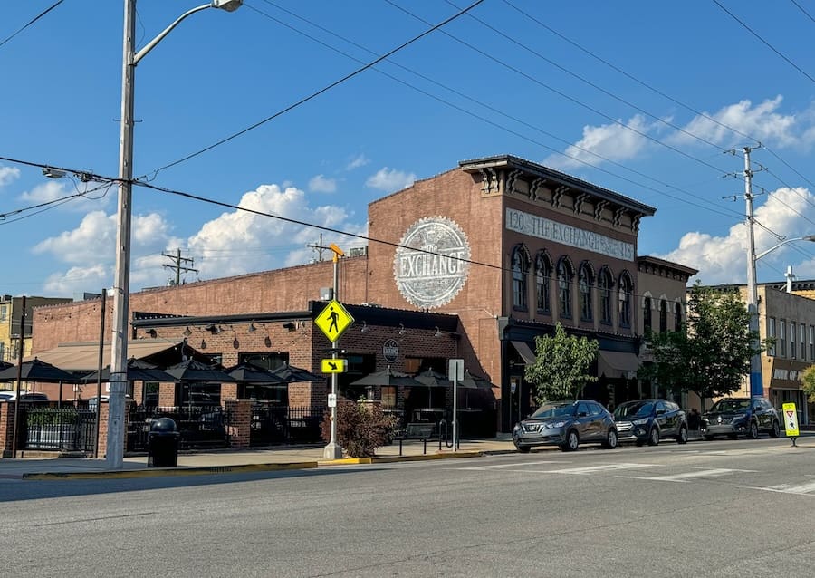 Image of brick building with a street in front of it in New Albany, Indiana. 