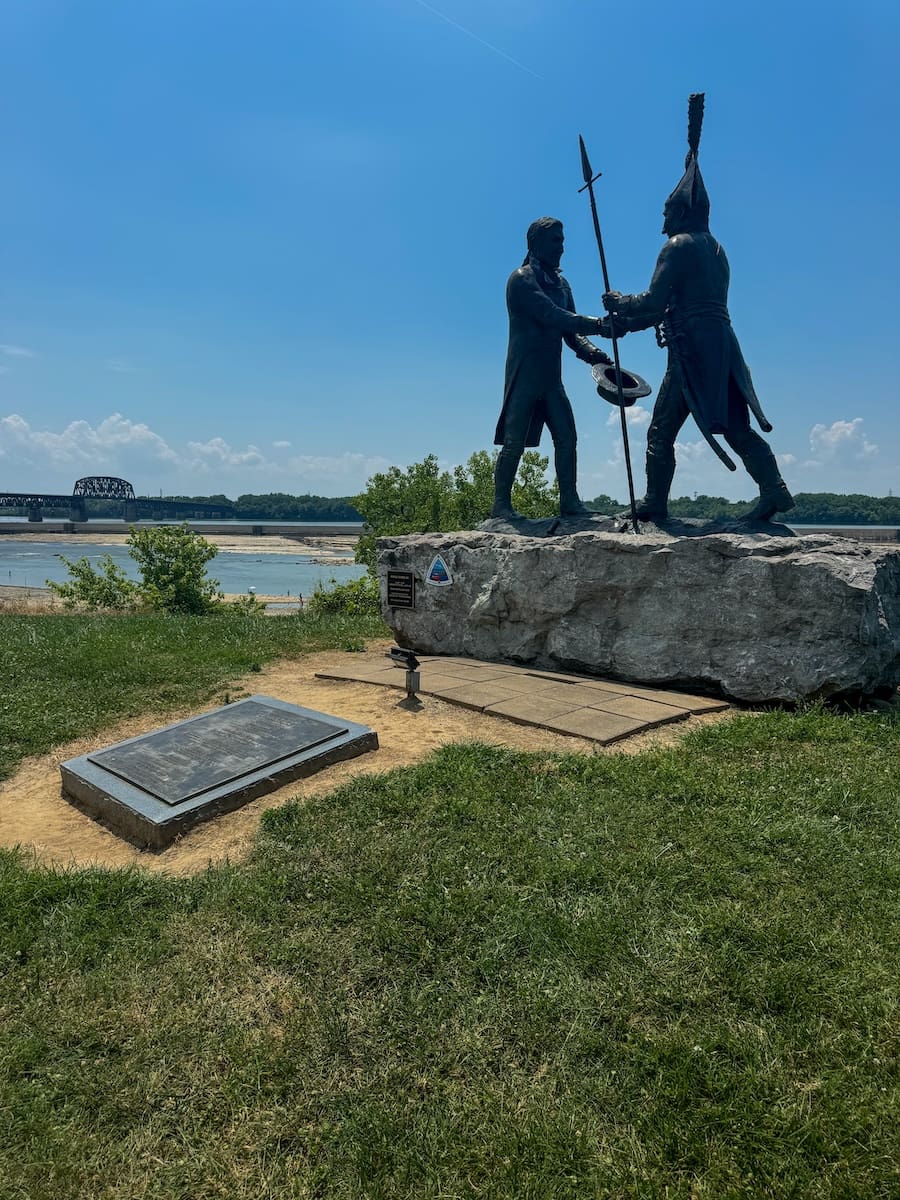 Statue of Lewis and Clark with river in the background at Falls of the Ohio State Park