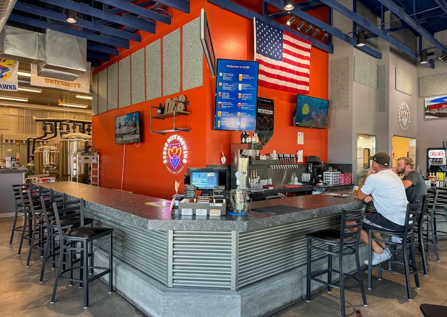 Image of the large bar and seating area at Dodge City Brewing