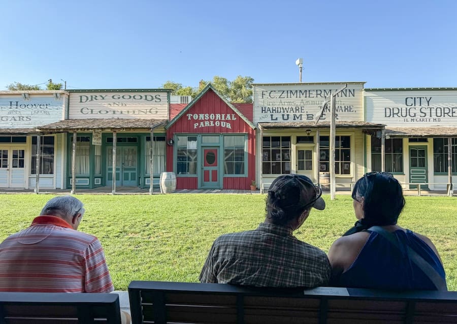 Image of a green space and buildings where a gun show reenactment takes place in Southwest Kansas