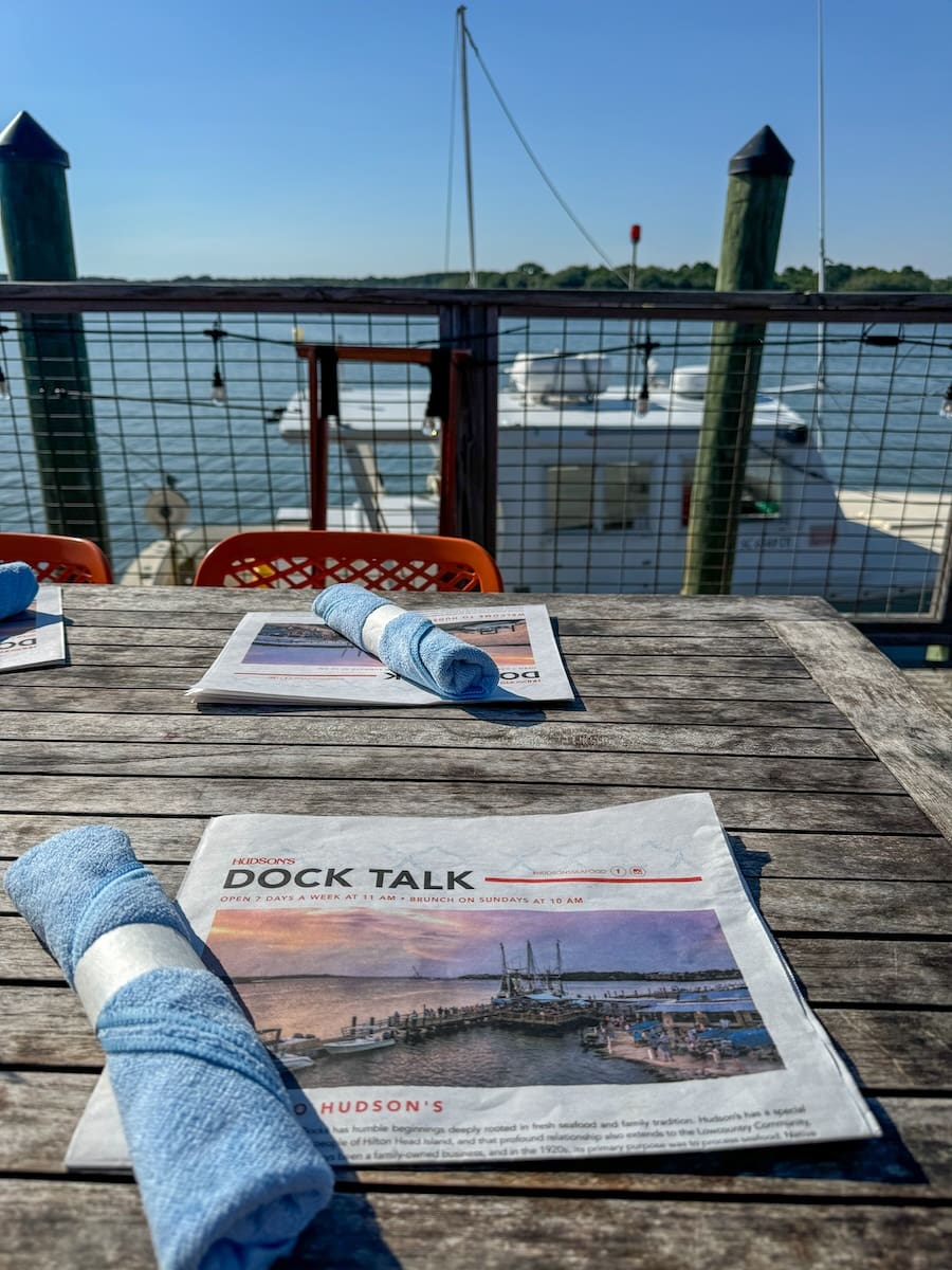 Image of table and menus along the water at Hudson's Dockside - Hilton Head Island