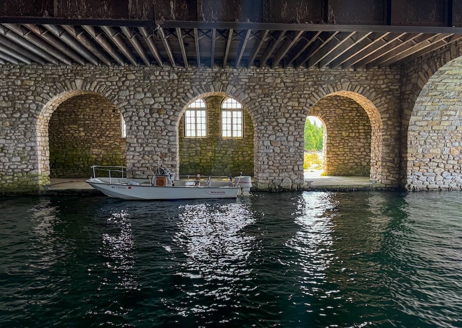 Image of the interior of a boathouse with one small boat - Rock Island State Park