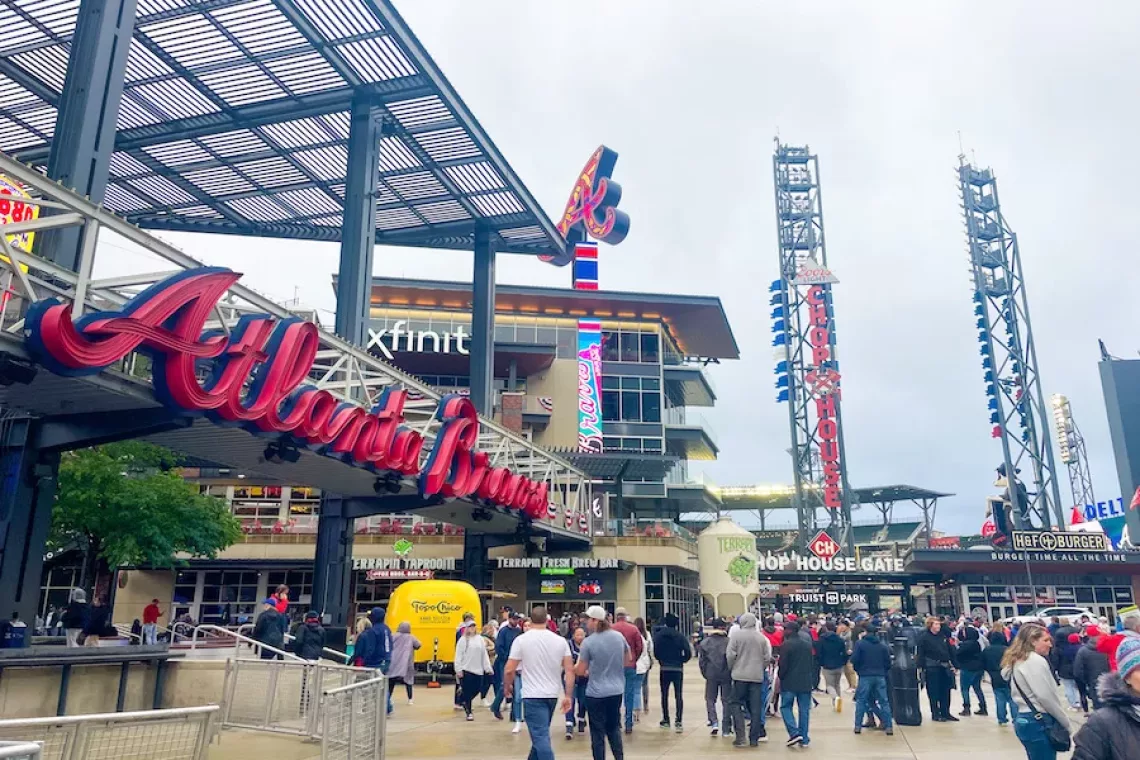 Atlanta Braves Stadium in the Battery surrounded by people ready for game day.