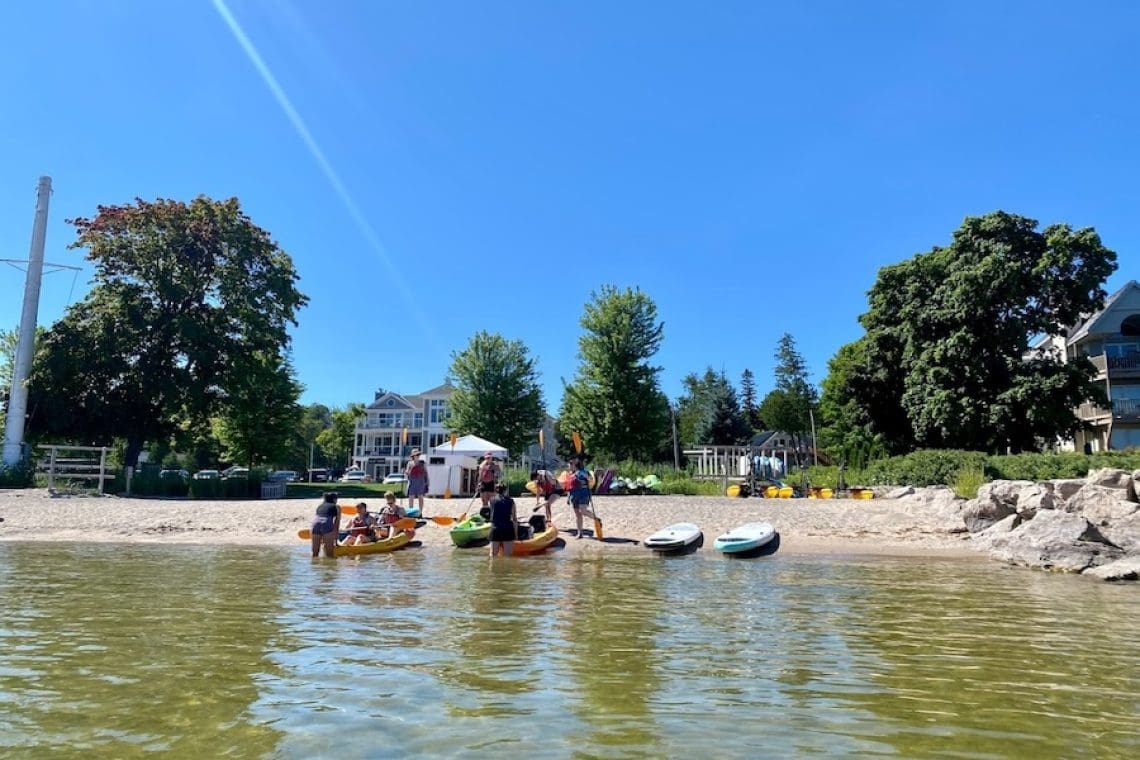 Image of kayakers launching into the water - Sister Bay, Door County, WI - Dog-Friendly Hotels in Door County